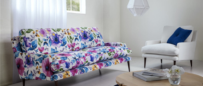 New upholstery fabrics with strong oversized florals prints and large scale designs in edgy, fashion colours by Charles Parsons Interiors